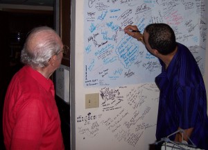 Richie Love signs next to Preston Love