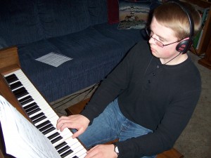 Calvin plays piano at Tesco Productions