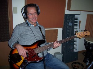 Lyle Yates listening to bass part at Tesco Productions