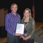 Tom Sharman receiving award from Carlene Crom