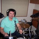 Mario records drums with Grupo David