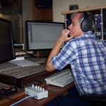 Tom Sharman watches Alexa's recording process.