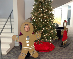 Tom Sharman behind gingerbread man at CIOH event.