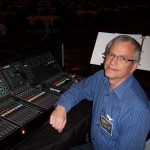 Tom Sharman engineering audio at CenturyLink Center for Home Instead Senior Care convention.