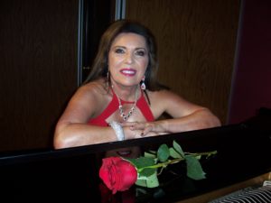 Carmelita de la Guardia at the piano.